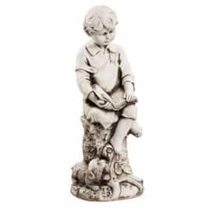 Boy with Dog on Stump Reading figurine